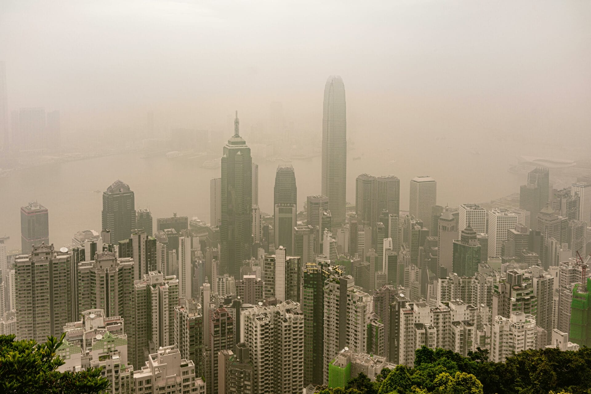 Aerial View of Skyscrapers in Downtown Hong Kong Covered in Smog